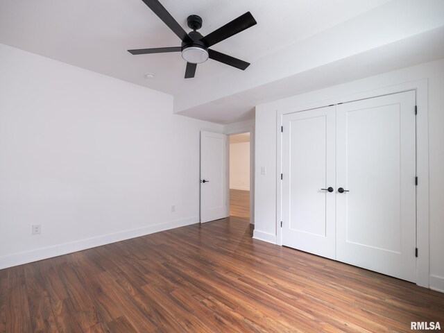 112 Shannon Hills Dr, Washington, IL 61571 - unfurnished bedroom featuring wood finished floors, baseboards, a closet, and a ceiling fan