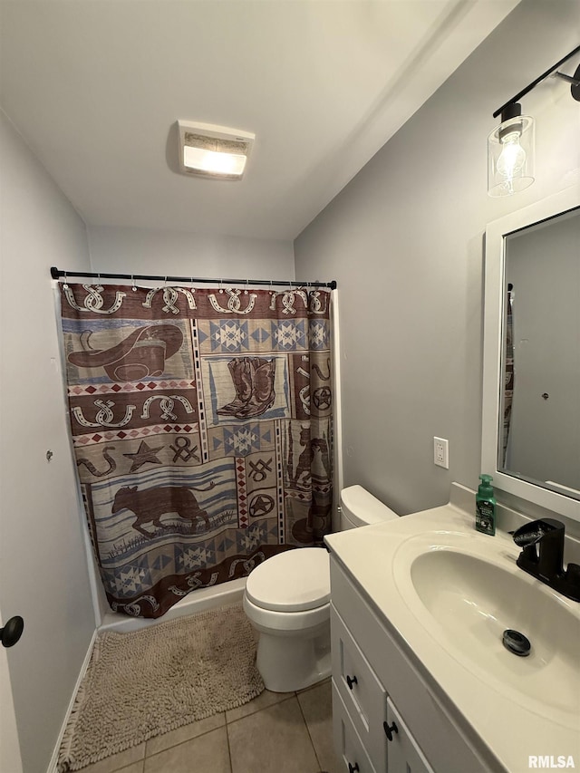 4170 E 1200th St, Macomb, IL 61455 - bathroom featuring vanity, toilet, tile patterned flooring, and curtained shower