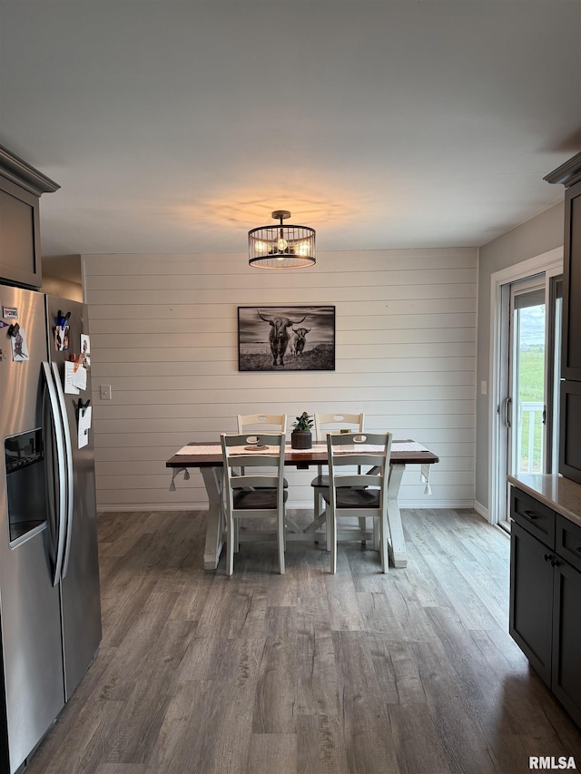 4170 E 1200th St, Macomb, IL 61455 - dining space featuring dark wood-style floors, a chandelier, and baseboards