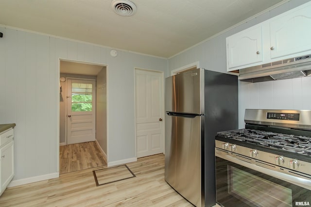 153 Hollywood Cir, Creve Coeur, IL 61610 - kitchen with appliances with stainless steel finishes, light wood-style flooring, crown molding, under cabinet range hood, and white cabinetry