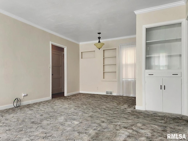 419 S Franklin St, Toulon, IL 61483 - unfurnished dining area featuring ornamental molding, carpet flooring, baseboards, and built in features