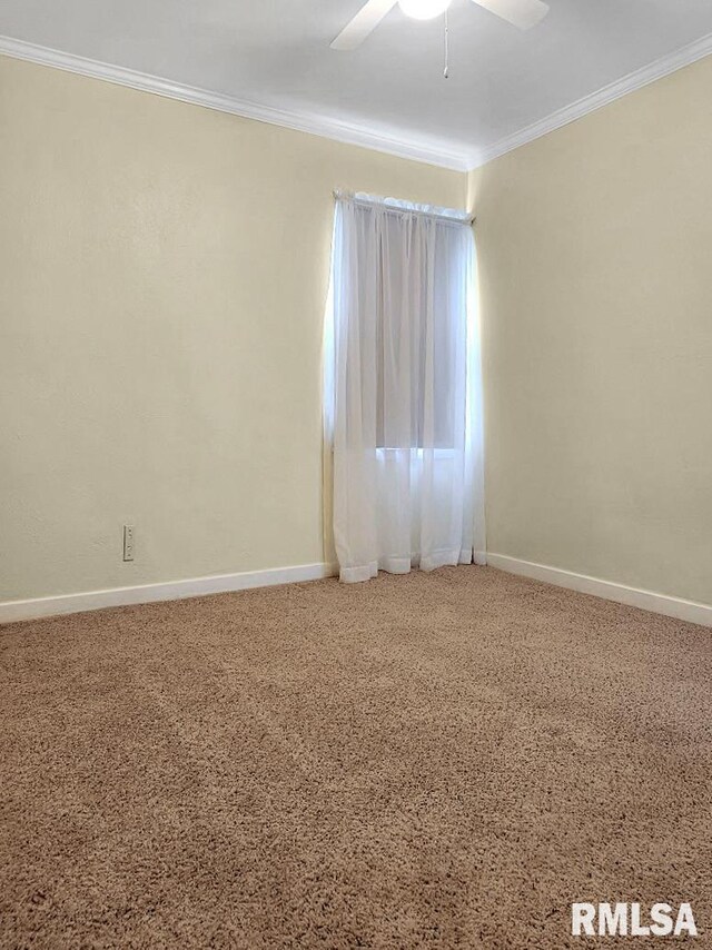 419 S Franklin St, Toulon, IL 61483 - empty room featuring ornamental molding, a ceiling fan, baseboards, and carpet flooring