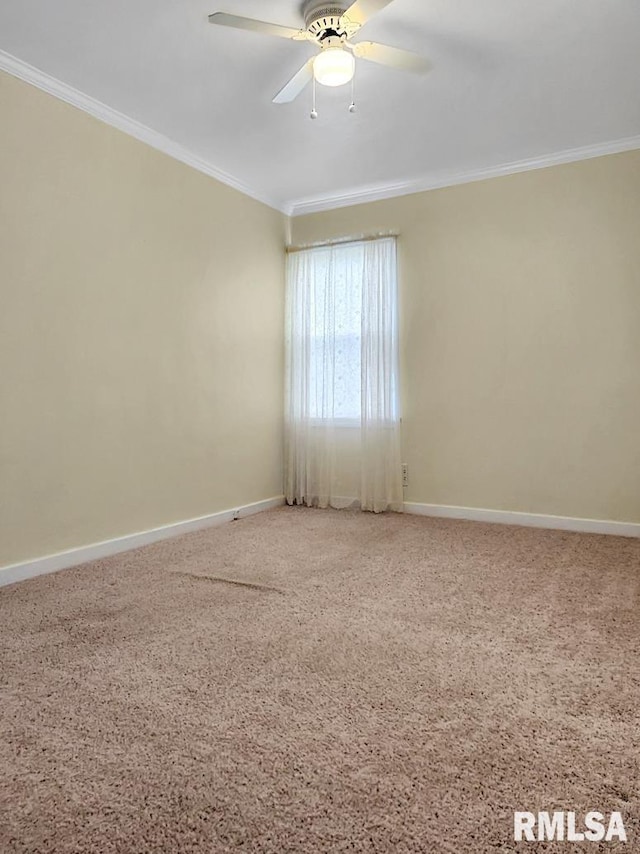 419 S Franklin St, Toulon, IL 61483 - carpeted spare room with ornamental molding, baseboards, and a ceiling fan