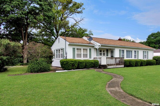 419 S Franklin St, Toulon, IL 61483 - ranch-style home with a front lawn, a chimney, and covered porch