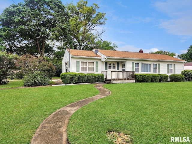 419 S Franklin St, Toulon, IL 61483 - ranch-style house with a front yard and a chimney