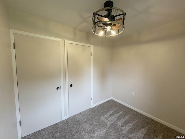 606 Lasalle Blvd, Marquette Heights, IL 61554 - spare room with dark colored carpet and baseboards