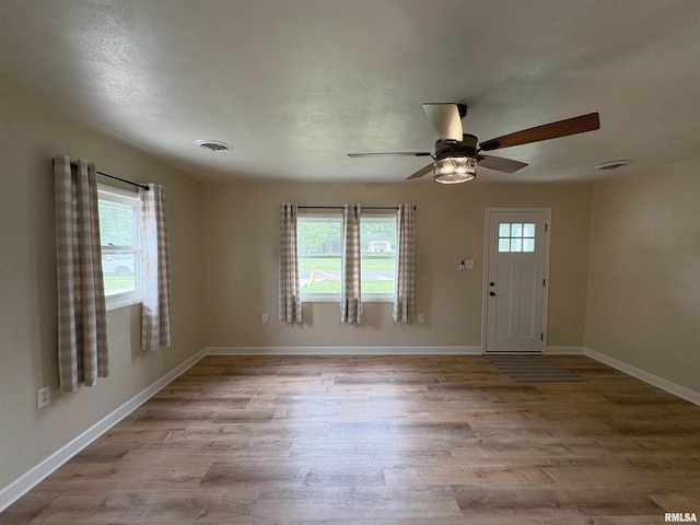 606 Lasalle Blvd, Marquette Heights, IL 61554 - entrance foyer with wood finished floors, a ceiling fan, and baseboards