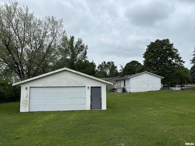 6 Bay Shore Dr, Lacon, IL 61540 - detached garage featuring central AC unit