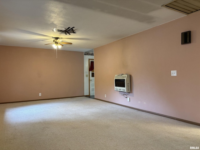 6 Bay Shore Dr, Lacon, IL 61540 - empty room featuring heating unit, a ceiling fan, light carpet, and baseboards