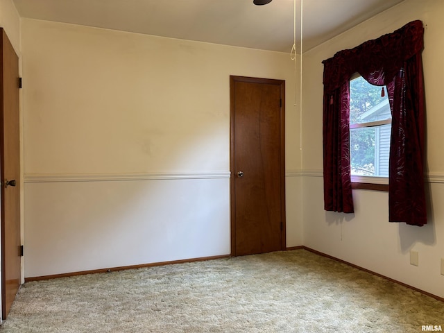 6 Bay Shore Dr, Lacon, IL 61540 - carpeted empty room featuring baseboards