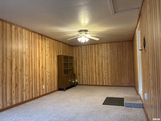 6 Bay Shore Dr, Lacon, IL 61540 - unfurnished room featuring ceiling fan, carpet floors, and wooden walls
