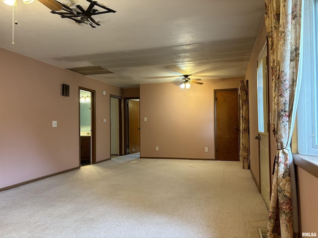 6 Bay Shore Dr, Lacon, IL 61540 - empty room with a ceiling fan, light carpet, and baseboards