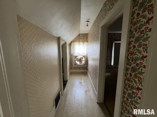 102 W 1st St, Table Grove, IL 61482 - hall with wallpapered walls, lofted ceiling, and baseboards