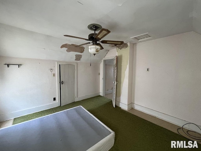 102 W 1st St, Table Grove, IL 61482 - additional living space with lofted ceiling, a ceiling fan, carpet floors, and baseboards