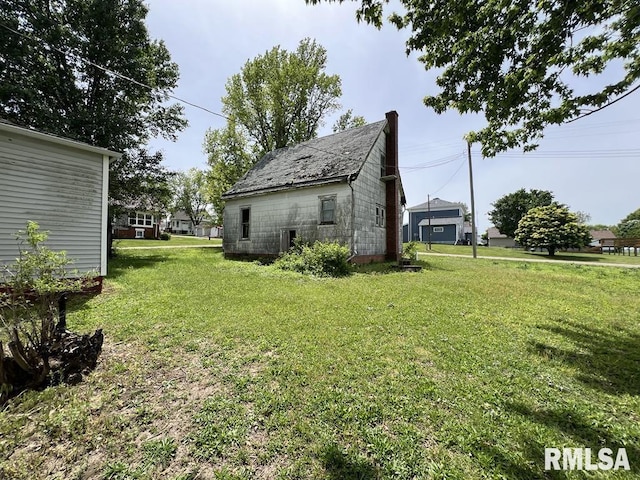102 W 1st St, Table Grove, IL 61482 - view of grassy yard