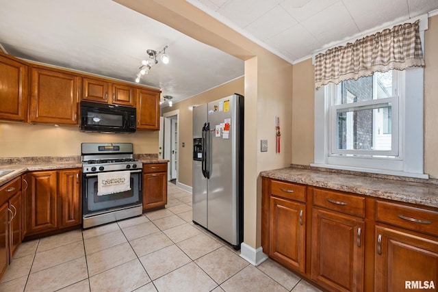 1614 W Columbia Ter, Peoria, IL 61606 - kitchen with appliances with stainless steel finishes, brown cabinetry, light tile patterned floors, and crown molding