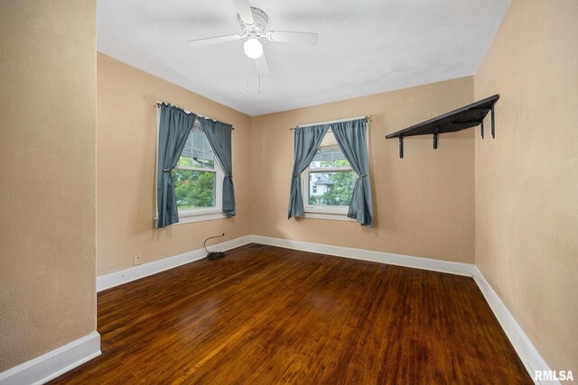 1614 W Columbia Ter, Peoria, IL 61606 - unfurnished room with wood finished floors, baseboards, and a ceiling fan