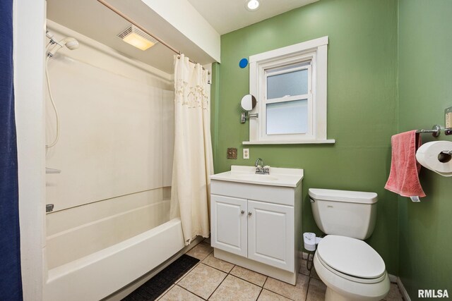 1614 W Columbia Ter, Peoria, IL 61606 - bathroom featuring tile patterned floors, toilet, shower / bath combo, and vanity