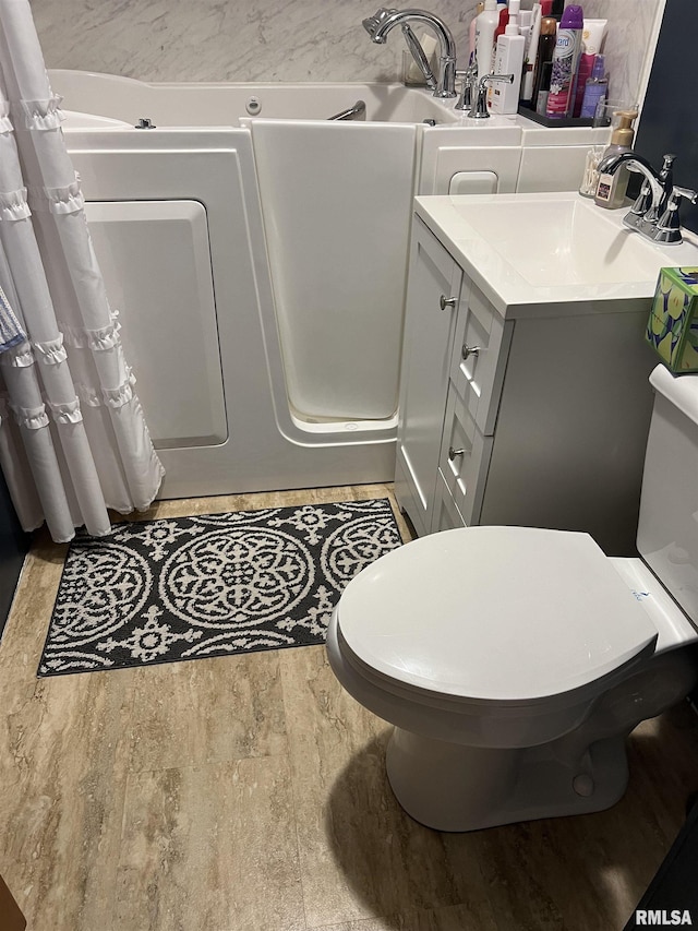 313 N Edwards St, Macomb, IL 61455 - full bath featuring toilet and vanity