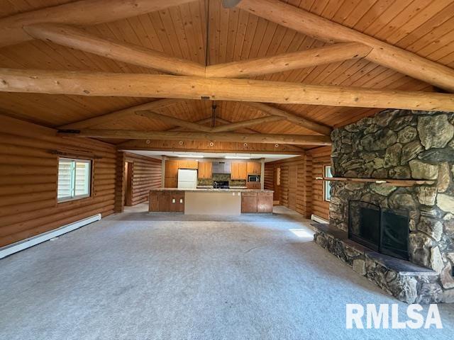 1 Marty Ln, Macomb, IL 61455 - unfurnished living room featuring wooden ceiling, light colored carpet, a fireplace, rustic walls, and a baseboard heating unit
