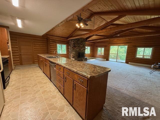 1 Marty Ln, Macomb, IL 61455 - kitchen with freestanding refrigerator, log walls, vaulted ceiling, range, and a ceiling fan
