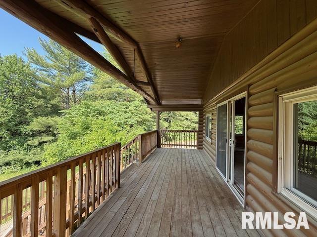 1 Marty Ln, Macomb, IL 61455 - kitchen featuring stainless steel dishwasher, log walls, ceiling fan, a sink, and wooden ceiling