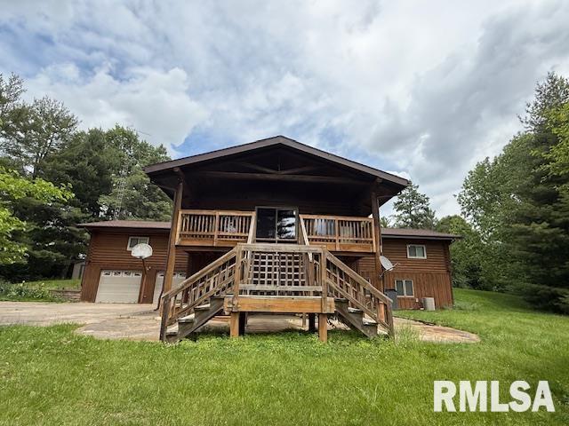 1 Marty Ln, Macomb, IL 61455 - view of play area featuring a yard and stairs