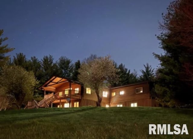 1 Marty Ln, Macomb, IL 61455 - back of property featuring a yard
