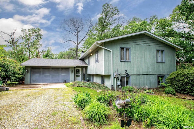 32 Black Partridge Run, Hopewell, IL 61565 - split level home with driveway and an attached garage