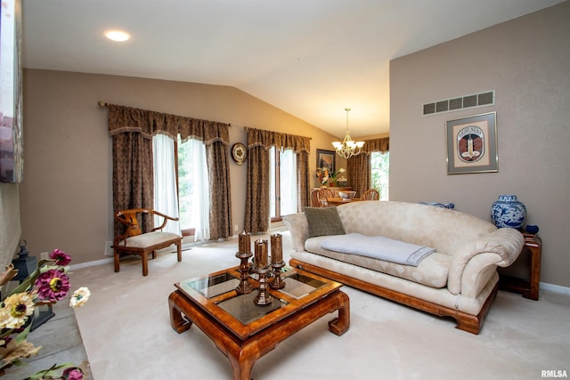 32 Black Partridge Run, Hopewell, IL 61565 - living area with a chandelier, lofted ceiling, healthy amount of natural light, and light colored carpet