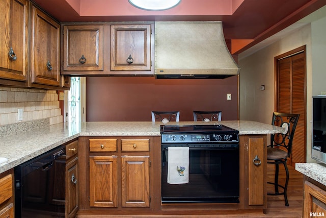 32 Black Partridge Run, Hopewell, IL 61565 - kitchen featuring black appliances, custom exhaust hood, brown cabinetry, and light countertops
