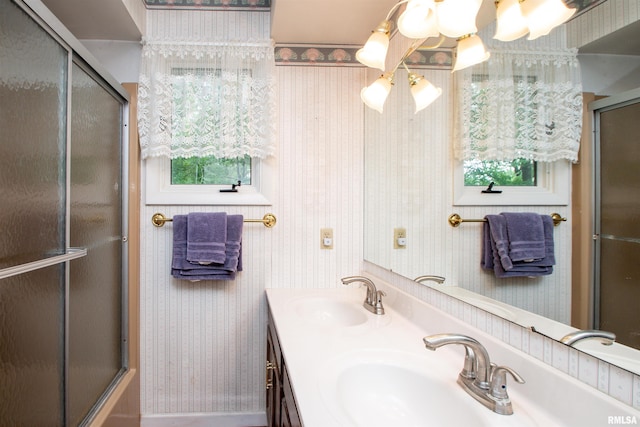 32 Black Partridge Run, Hopewell, IL 61565 - bathroom with wallpapered walls, healthy amount of natural light, and double vanity