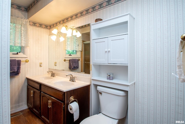 32 Black Partridge Run, Hopewell, IL 61565 - full bath with double vanity, wood finished floors, and a shower with shower door