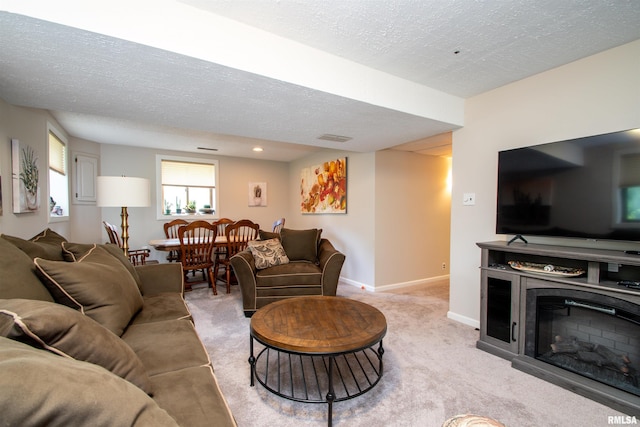 32 Black Partridge Run, Hopewell, IL 61565 - living room featuring a textured ceiling and light carpet