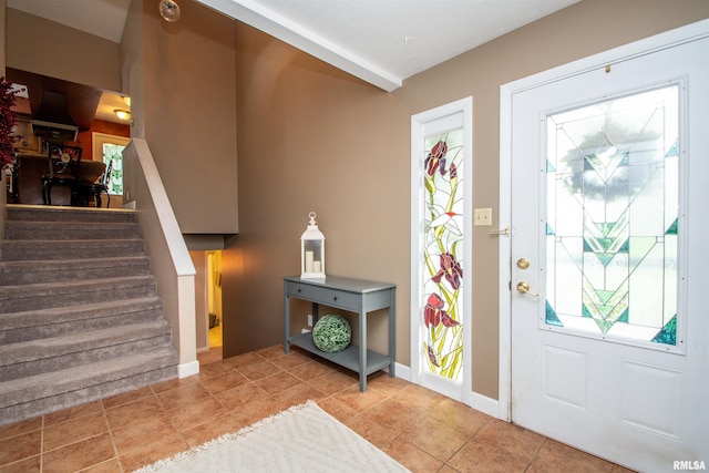 32 Black Partridge Run, Hopewell, IL 61565 - foyer entrance with stairs and light tile patterned floors