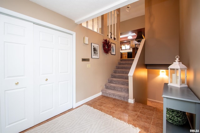32 Black Partridge Run, Hopewell, IL 61565 - stairs with baseboards and tile patterned flooring