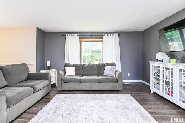 311 Juniper Ln, East Peoria, IL 61611 - living area featuring dark wood-style flooring and baseboards