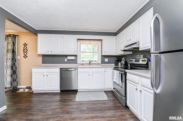 311 Juniper Ln, East Peoria, IL 61611 - kitchen featuring stainless steel appliances, a sink, under cabinet range hood, light countertops, and white cabinets