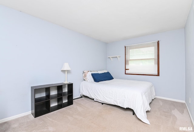 311 Juniper Ln, East Peoria, IL 61611 - carpeted bedroom featuring baseboards