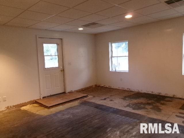 837 E Chestnut St, Canton, IL 61520 - unfurnished room with healthy amount of natural light and a paneled ceiling