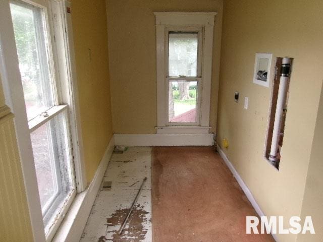 896 E Chestnut St, Canton, IL 61520 - spare room featuring baseboards