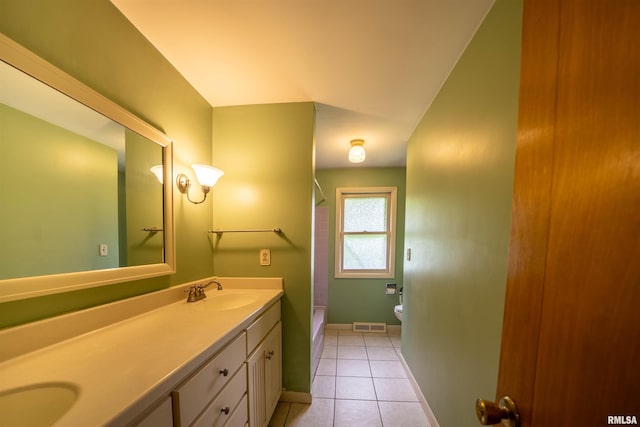 23907 Veterans Rd, Morton, IL 61550 - full bathroom with double vanity, toilet, baseboards, tile patterned flooring, and shower / bath combination with curtain
