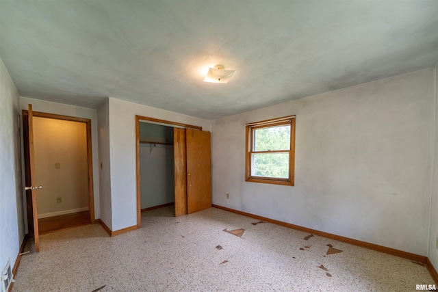 23907 Veterans Rd, Morton, IL 61550 - unfurnished bedroom with baseboards and a closet