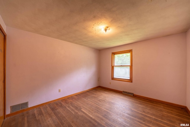 23907 Veterans Rd, Morton, IL 61550 - spare room with hardwood / wood-style floors and baseboards