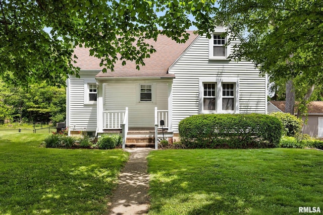 1017 Miller St, Washington, IL 61571 - back of house with a lawn and a shingled roof