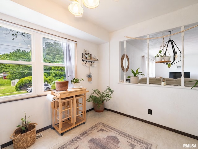 1402 Lincoln Rd, Marquette Heights, IL 61554 - living area featuring baseboards and light tile patterned floors