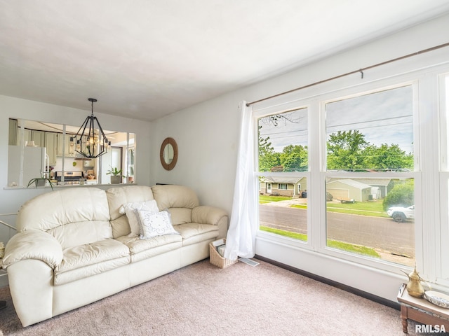 1402 Lincoln Rd, Marquette Heights, IL 61554 - living room with a chandelier and carpet