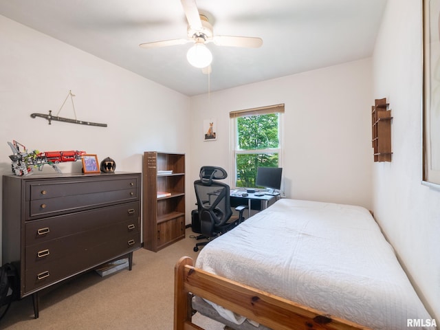 1402 Lincoln Rd, Marquette Heights, IL 61554 - bedroom with light colored carpet, an office area, and a ceiling fan