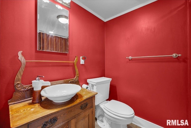 701 E Pearl St, Tremont, IL 61568 - half bathroom featuring ornamental molding, vanity, and toilet