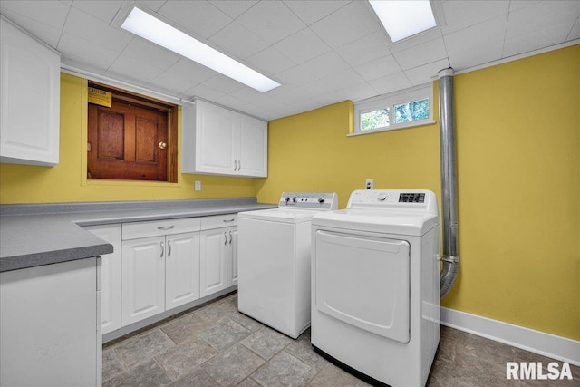 701 E Pearl St, Tremont, IL 61568 - washroom with washing machine and clothes dryer, cabinet space, and baseboards
